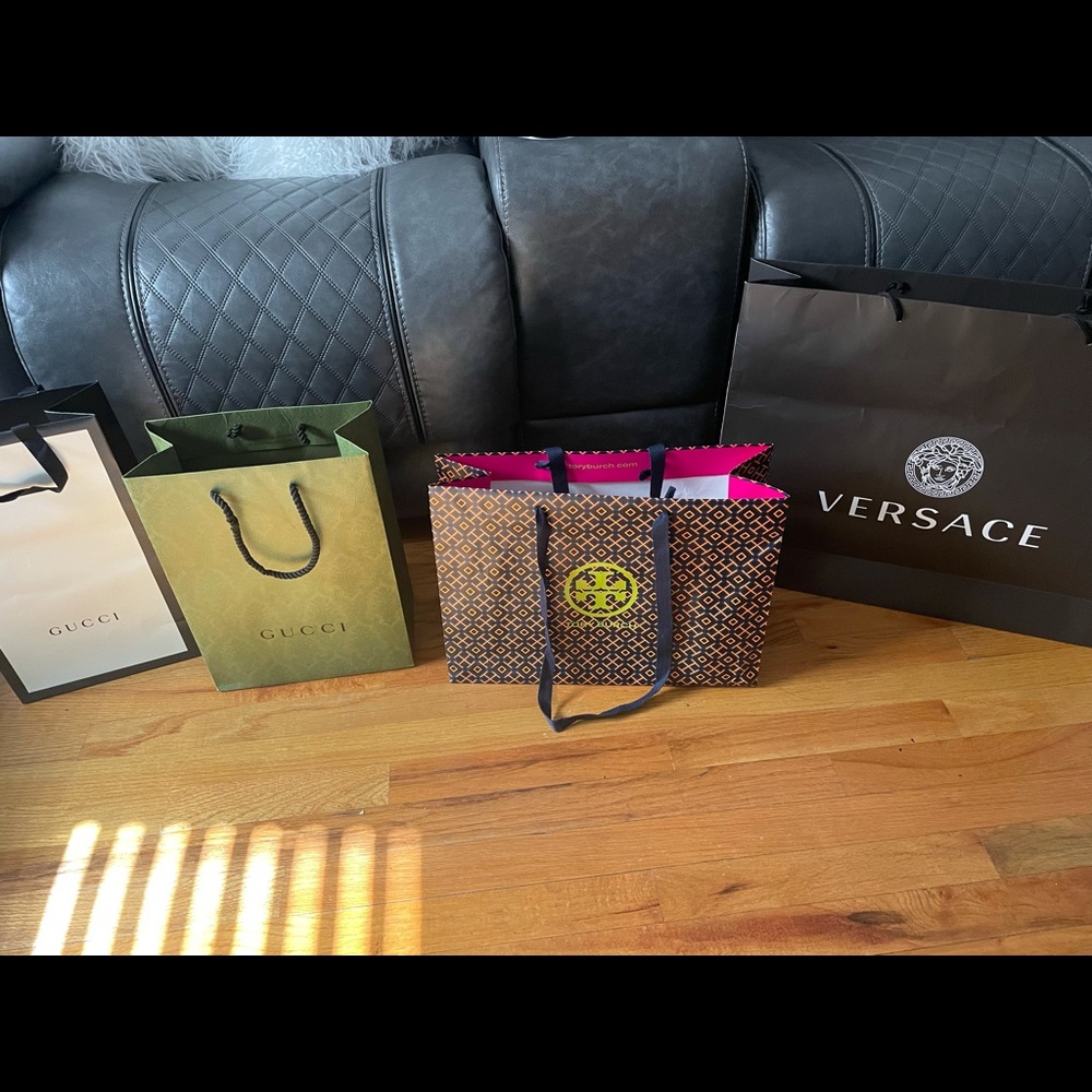 2 gucci 1 Versace 2 Jimmy Choo 2 Tory Burch papers bags
